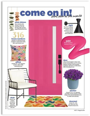 Electric pink front door by Simpson paired with bright accessories to complete a summer front porch look. 