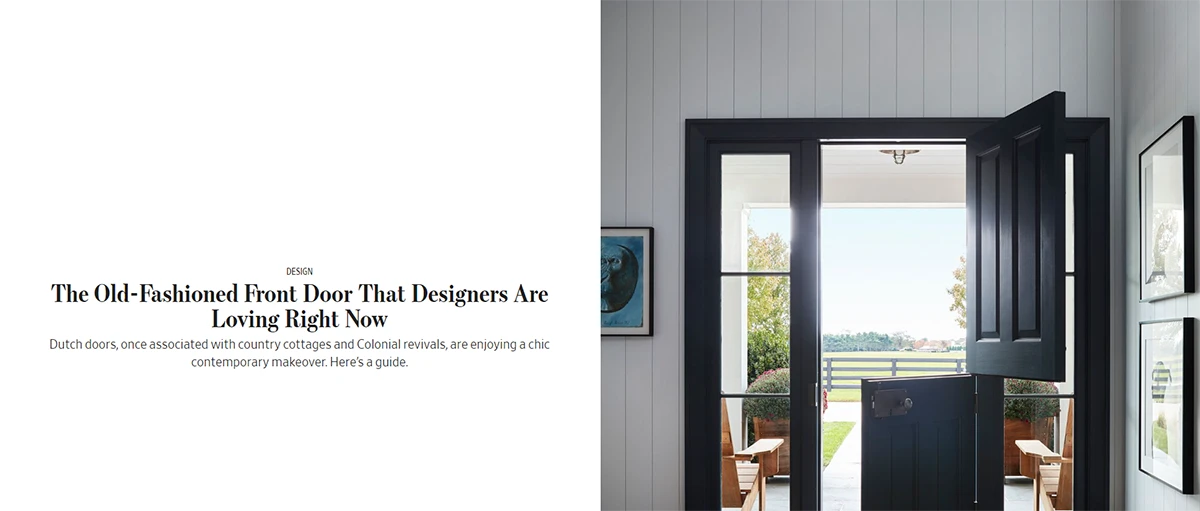 View of the article with dark dutch door opened to the front porch and yard.