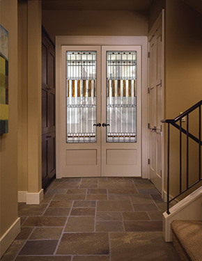 Room with interior wood french doors