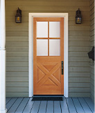 Dog Sitting on Front Porch with Yellow Dutch Door
